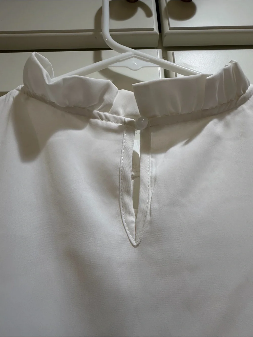 White Ruffle-Trim Sleeveless Tank Blouse